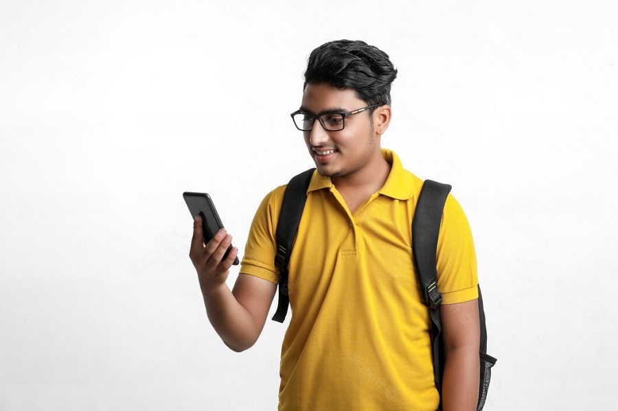 indian student on mobile phone