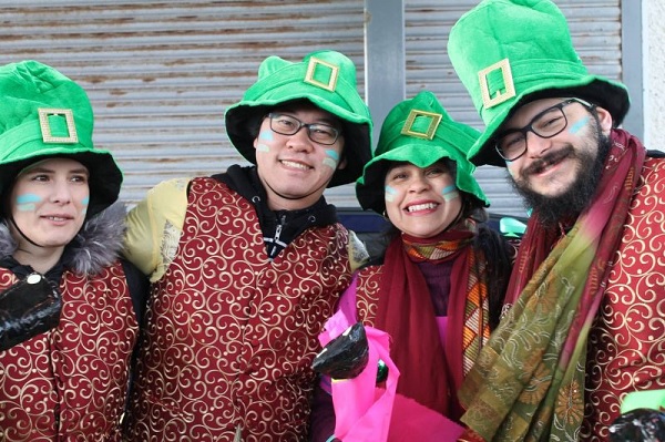 international students in-irish hats
